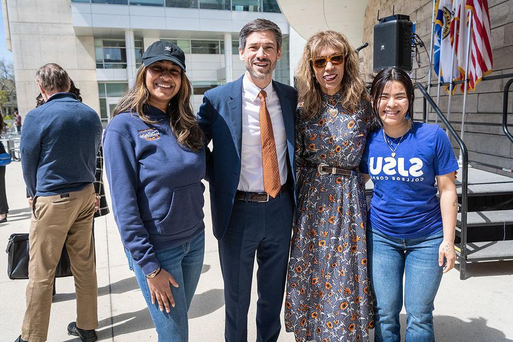 The president posing with the mayor of San Jose and friends.